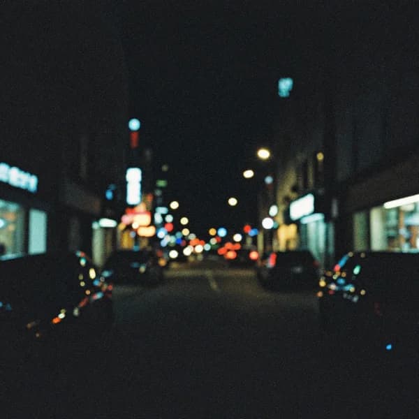 Noisy photograph before AI denoising - visible grain and digital noise